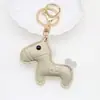 Colgante original de caballo lindo para el Año del Caballo, muñeca de cuero estilo miu en colores macarrón, dijes para bolso al por mayor