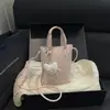 Bolso bandolera nuevo de principios de otoño 2026, bolso de mano cuadrado pequeño de moda niche vintage para mujer, bolso de hombro casual simple y moderno