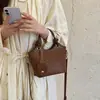 Bolsa Saco Trançada Estilo Coreano da Moda para Mulheres 2026 Outono/Inverno Nova Moda Bolsa de Mão Bolsa Transversal Bolsa de Ombro Simples para o Dia a Dia