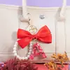 Fornecedor e Vendedor de Chaveiros com Letras do Alfabeto de Lantejoulas Roxas, Chaveiros com Pompons de Borboleta, Pingentes para Bolsas Femininas
