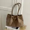 Bolsa tote minimalista transfronteiriça para mulheres, novo modelo outono 2026, bolsa de mão diária requintada e estilosa, bolsa de ombro, bolsa de antebraço