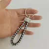 Nuevo llavero de cuerda de cuero trenzado de diamante, llavero para pareja, llavero creativo para coche, adornos para bolso, venta al por mayor