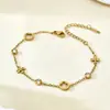 Estilo Europeu e Americano Trevo de Quatro Folhas Cravejado com Diamantes Aço Inoxidável Banhado a Ouro 18K Pulseira de Luxo de Nicho High-End para Mulheres Versátil Atacado