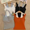 1940 # Estilo chica picante sexy top corto tipo camisola con cuello halter, botones y copas en el pecho, sin mangas
