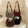 Bolsas vintage transfronterizas de nicho para mujer Otoño e Invierno 2026 nueva bolsa cruzada versátil de moda bolsa de hombro tipo albóndiga de moda