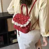 Mochila Feminina Linda de Bolinhas com Laço de Renda 2026 Nova Versátil Tendência Pequena de Alta Qualidade