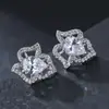 Dulce y encantador temperamento Princesa socialité flor circón cobre aretes aretes transfronterizos dedicados a explosiones de deseos aretes