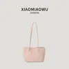 Bolsa de mano transfronteriza para mujer 2026, adecuada para ir al trabajo, con un estilo retro y casual, color liso, ligera, versátil y con un look relajado y chic con material de gamuza