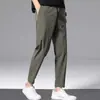 Calça esportiva masculina de verão estilo americano, de seda gelada, secagem rápida, corta-vento, tendência e versátil, com caimento fluido, adequada para uso casual