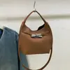 Bolsa de Mão Elegante de Alta Qualidade Transfronteiriça para Mulheres 2026 Nova Moda Versátil Bolsa Transversal Super Popular Bolsa de Mão Estilo Balde
