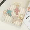Llavero de cruz de pedrería colorida estilo coreano con cierre de langosta dorado, colgante de pedrería, accesorio de bolsa femenino