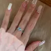 Anillo de Diamante Azul Entrelazado de Glaciar de Gama Alta para Mujer, Lujo Accesible, Dulce Elegante, Anillo de Moda y Versátil