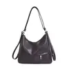 Bolso de mano simple de color liso para empanadillas, nuevo bolso de hombro de moda estilo motocicleta 2026, bolso cruzado retro para el día a día