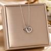 TikTok Express - Venta en vivo de collar de acero de titanio para mujer con microincrustaciones de diamantes, anillo doble, colgante de amor, cadena de clavícula con temperamento, joyería
