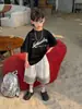 Tai Ru 2026 Verão Novo Infantil Estilo Coreano Lavado Estampa de Letras Manga Curta Meninos Moda Casual Meia Manga Tendência