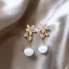 Pendientes coreanos de plata 925 con forma de ojo de gato y flor, transparentes y exquisitos, de moda, con el mismo estilo de las celebridades de Internet.