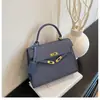 Bolsos de Mujer de Moda de Este Año 2026 Primavera y Otoño Nuevo Bolso Kelly para el Trabajo Pequeño Cuadrado Elegante de Hombro Cruzado