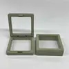 Cajas flotantes en stock directamente del fabricante, venta al por mayor por caja, empaque de almacenamiento para joyería, exhibidor de llaveros de juguete