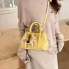 Bolso de Mano de Diseño de Moda de Nicho para Mujer 2026 Nuevo Estilo Coreano Bolso Cubo para Viajes Diarios Bolso de Hombro Único Cruzado Transfronterizo