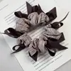 1. Goma para el pelo vintage de flores oscuras con una textura madura y suave, adecuada para ir al trabajo, accesorio para el cabello duradero y versátil para mujeres