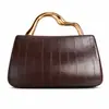 Bolso de Mano Pequeño de PU de Nuevo Estilo Transfronterizo Europeo y Americano, Bolso de Hombro y Cruzado de Moda con Personalidad para la Noche, Venta al por Mayor desde el Fabricante