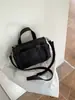 Estilo Coreano Nicho Nylon Portalápices Bolsa para Teléfono Simple Nueva Casual Bolso Pequeño de Hombro Cruzado Bolso de Mano Pequeño Versátil para Mujeres