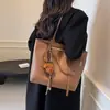 Sacola transfronteiriça feminina de grande capacidade 2024 Novo estilo Bolsa Outono High-end Bolsa de ombro Bolsa geral de estudante universitário