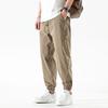 Pantalones casuales de seda fina de verano para hombre, negros, sueltos, de talla grande, elásticos, estilo americano, de marca de moda, de secado rápido, pantalones deportivos recortados