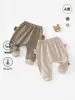 Pantalones de algodón suave Clase A para bebé de otoño, ropa exterior para bebé de pierna ancha, pantalones casuales a rayas con cara sonriente para niños