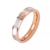 Nueva moda simple tres diamantes color concha anillo de diamantes acero de titanio chapado en oro rosa amantes anillo de comida al por mayor
