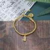 Nuevo Estilo Chino 2025 Retro Colgante de Fortuna Dios Amarillo de la Riqueza Pulsera de Arena Dorada con Cuentas Lujo Ligero Nicho Exquisita Pulsera para Mujeres Fábrica