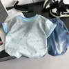 Conjunto de Ropa de Verano para Niños Niños 2026 Nueva Moda para Niños Pequeños Cuello Redondo Manga Corta Pantalones Cortos Conjunto de Dos Piezas Moderno Venta al por Mayor