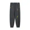 Pantalones Largos Casuales Unisex con Estampado de Letras Logo y Cordón Estilo Básico Tinta Salpicada Ropa de Pareja