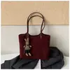 Bolso de alta gama de gran capacidad para mujer 2026 nuevo súper popular de un solo hombro para debajo del brazo nicho de lujo ligero bolsa de mano para el trabajo
