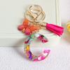 Llavero con borla de mariposa de 26 letras con pegamento de piedra de cristal y 26 letras de Creative Europe y Estados Unidos, joyería colgante.