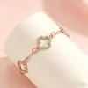 Suministro Transfronterizo Nuevo Modelo Flor de Cuatro Hojas Hueca Microincrustada de Zirconia Conjunto de Tres Piezas Estilo Europeo y Americano Hiyin Comercio Exterior Conjunto de Joyería de Venta Caliente