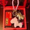 Llavero 2026 Año del Caballo Colgante de Bolsa Dorada Adorno Creativo de Caballo Pequeño Regalo Pequeño para Eventos Al por Mayor