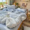 Nuevo juego de cuatro piezas jacquard teñido en hilo de alto peso, estilo simple y fresco, ropa de cama estilo princesa de lujo ligero