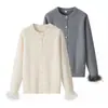 Ins transfronterizo europeo y americano 2026 nueva moda elegante ropa de mujer al por mayor cuello redondo versátil cárdigan de punto decorado con plumas