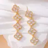 Pendientes de lujo ligeros de alta gama con temperamento de hierba de la suerte, aguja de plata s925, borla larga de circonita, pendientes de flores de viajero de moda