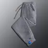 Pantalones de chándal para hombre Otoño Nueva Moda Tendencia Estilo Celebridad de Internet Jogger Cordón de Colores Algodón Juventud Casual Gris Pantalones Deportivos