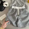 Shorts de verano para niños y niñas, modernos, infantiles, a la moda, estilo británico y coreano, shorts de color block a cuadros de moda hasta la rodilla