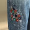 Primavera 2024 nuevo estilo artístico cintura elástica simple flor pequeña bordada jeans harem pantalones casuales de mujer
