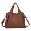 Bolsas de Cuero Suave Nuevas Otoño/Invierno 2025 Bolso Cubo de Alta Gama Moderno Gran Capacidad Bolso de Mano para Viajes Diarios Bolso de Hombro