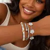 Pulseira de Aço Titânio Europeia e Americana Transfronteiriça Mais Vendida Pulseira Simples Feminina tk Pulseira de Unha Quatro Folhas Mais Vendida Atacado