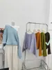 Suéter de punto atmosférico de hombros descubiertos, nuevo estilo coreano otoño/invierno 2026, holgado y versátil, top de punto de estilo casual para mujer