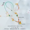 Collar Puzo Gold Store estilo mismo, candado de nube calabaza chapado en oro con mantra de seis caracteres, cadena para suéter con cordón colgante de múltiples tesoros tejido a mano