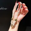 Pulsera de Muñeca de Color Caramelo de Moda Pulsera Corta de Perlas Redondas con Diamantes Venta Caliente Transfronteriza Correa de Mano Antiperdida y Anticaída Estilo Caliente