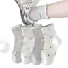 Nuevo estilo popular 2026: calcetines de tobillo con lazo color gris brezo, calcetines de media pantorrilla para mujer para primavera y otoño, diseño simple de encaje otoño/invierno, estilo coreano, modernos