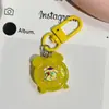 Lindo Llavero Luminoso Translúcido con Forma de Despertador, Dulce Colgante de Dibujos Animados Sanrio, Accesorio Colgante para Mochila de Estudiante